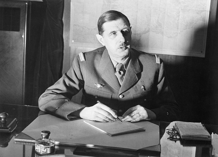 800px-Commander_of_Free_French_Forces_General_Charles_de_Gaulle_seated_at_his_desk_in_London_during_the_Second_World_War._D1973